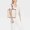 XL Cut Out Tote Handbag - A New Day™ 1 XL Cut Out Tote Handbag - A New Day™ -A New Day™ GUEST 0e63d638 00f9 4f23 80c9 b31db247db3a