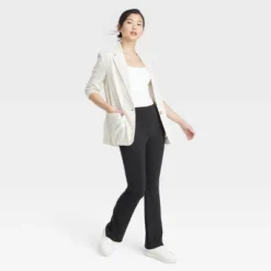 Women's Fold Over Waistband Flare Leggings With Pockets - A New Day™ Black -A New Day™ GUEST 18721912 a31a 4e59 9e12 d4ed1d19409b